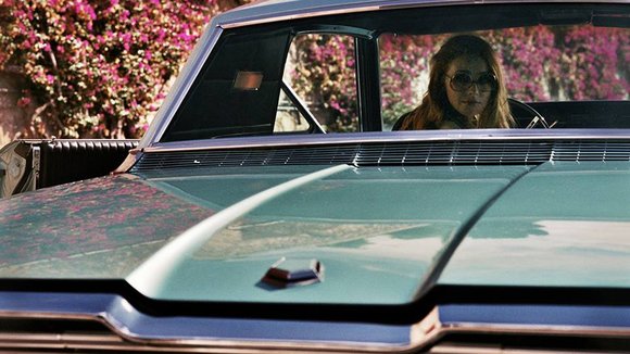 Photo from the movie The Lady in the Car with Glasses and a Gun